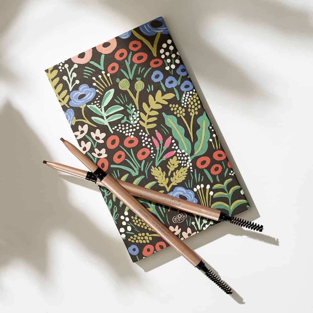 Retractable eyebrow brush