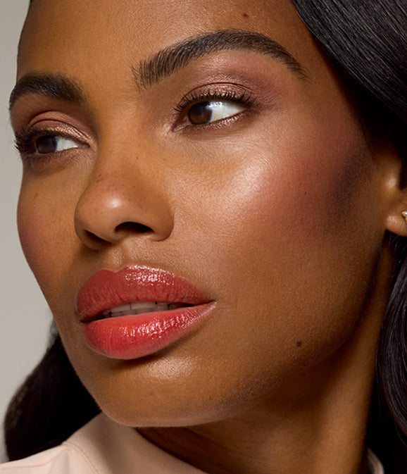 woman with a holiday glow makeup look