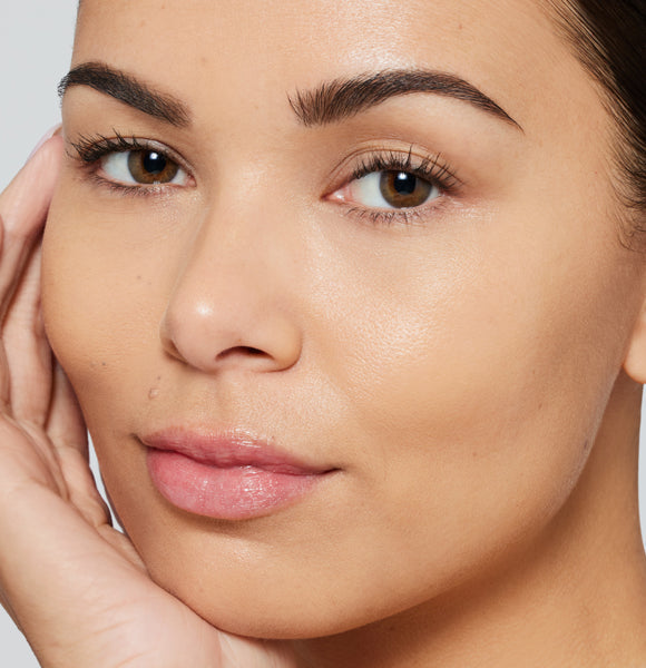 model wearing skintuition liquid foundation