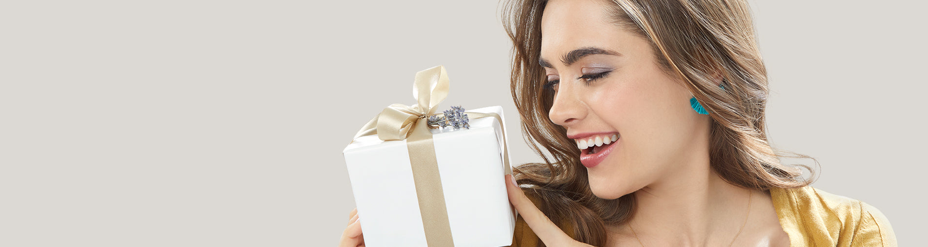 model holding a gift